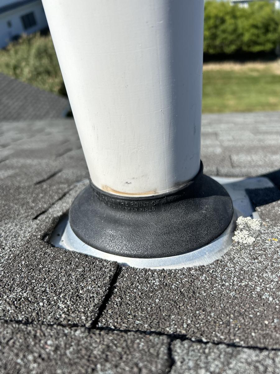 New properly flashed and sealed plumbing vent pipe boot after repair by David Deschaine Roofing